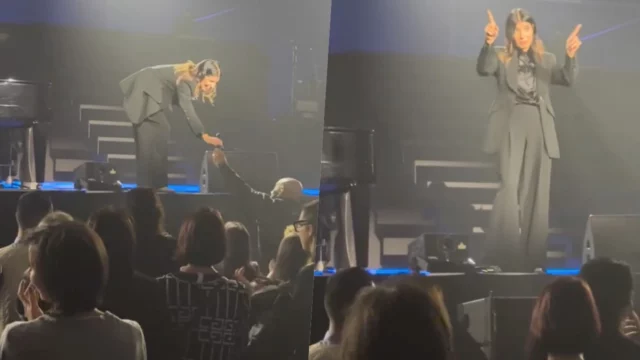 Giorgia fa cantare una fan con il suo microfono ad un concerto